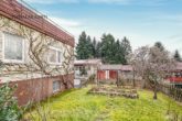Urgemütliches Einfamilienhaus mit tollem Grundstück in ruhiger Wohnlage - Seitenansicht mit Garten