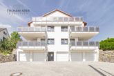 NEUBAU - Helle 3 Zimmer EG Wohnung mit Balkon und Garage - Hausansicht