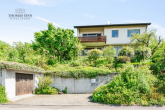 SCHÖNES EINFAMILIENHAUS MIT HANGGESCHOSS IN TOP AUSSICHTSLAGE VON MICHELBACH - Hausansicht