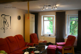 ALTBAU DHH MIT KLINKERFASSADE IN RUHIGER WOHNLAGE - EG: Wohnzimmer
