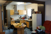 ALTBAU DHH MIT KLINKERFASSADE IN RUHIGER WOHNLAGE - EG: Wohnzimmer