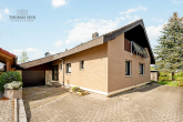 SCHÖNES EINFAMILIENHAUS MIT KLINKERFASSADE UND FANTASTISCHEM GRUNDSTÜCK AN DIREKTER WIESENRANDLAGE! - Straßenansicht