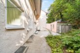 Energetisch saniertes Einfamilienhaus mit Garten und Garage in bevorzugter Lage - Terrasse hinter dem Haus