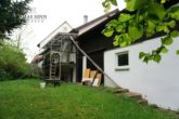 Einfamilienhaus mit DG-ELW, großem Grundstück und Scheune - Ideal für Handwerker oder Hobbylandwirte - Gartenansicht