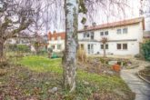 Freistehendes Einfamilienhaus mit liebevoller Gartenoase in ruhiger Wohnlage - Gartenansicht
