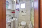 Freistehendes Einfamilienhaus mit liebevoller Gartenoase in ruhiger Wohnlage - EG: WC