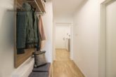 Moderne und barrierearme EG-Wohnung – ideal für Jung und Alt! - Flur mit Blick Richtung Eingang