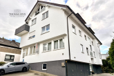 Helle charmante 3,5-Zimmer Galerie-Wohnung mit Balkon und Garage in ruhiger Seitenstraße - Hausansicht
