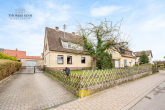 Wohnen mit Vision – Sanierungsbedürftiges Haus auf herrlichem Grundstück - Hausansicht