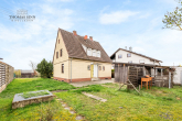 Wohnen mit Vision – Sanierungsbedürftiges Haus auf herrlichem Grundstück - Hausansicht