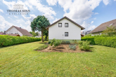 Renovierungsbedürftiges Zweifamilienhaus in ruhiger Lage - Große Garage, weitläufiges Grundstück - Gartenansicht