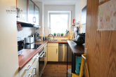 GUT VERMIETETE 2-ZIMMER-WOHNUNG MIT BALKON UND TG-STELLPLATZ IN RUHIGER WOHNGEGEND - Küche