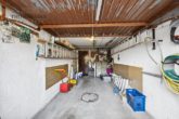 Renovierungsbedürftiges Reihenmittelhaus in ruhiger Randlage mit Blick ins Grüne - kurzfristig frei! - UG: Garage