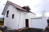 NEUBAU - Einfamilienhaus mit hochwertiger Ausstattung in guter Randlage und bester Energieklasse A+ - Hausansicht Eingang