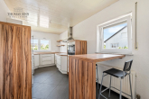 GERÄUMIGE 3 ZIMMER WOHNUNG MIT GEMÜTLICHER, ÜBERDACHTER SOMMERTERRASSE - Küche