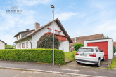 SCHÖNE 4,5 ZIMMER DOPPELHAUS-MAISONETTE WOHNUNG MIT GROßER TERRASSE IN SCHÖNER WOHNLAGE - Straßenansicht